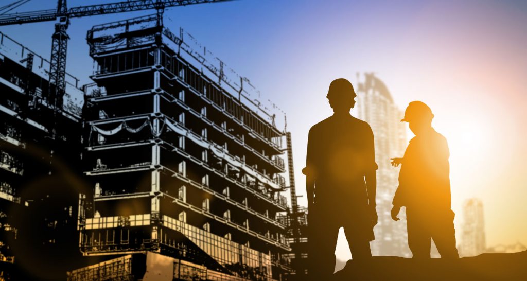 engineers surveying a building under construction 1500x800